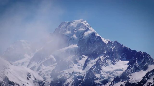 Close up pf Mount Cook above the clouds. Tight shot.