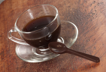 Chocolate spoon and coffee