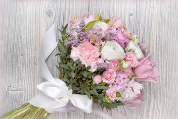 Valentine flowers on wooden background