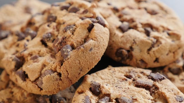 Chocolate chip cake cookies on the wooden table 4K 2160p UltraHD footage - Arranged on wooden surface chocolate cookies 4K 3840X2160 UHD video 