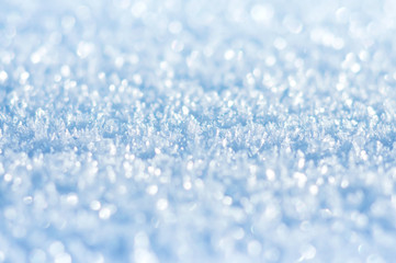 Bright winter background of brilliant snow crystals
