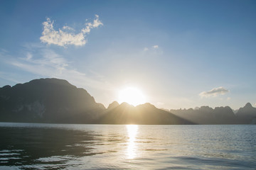 Sun rise behind mountain at Khao Sok National Park, Surat Thani