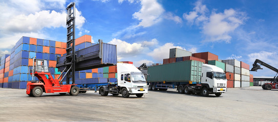 forklift handling the container box at dockyard