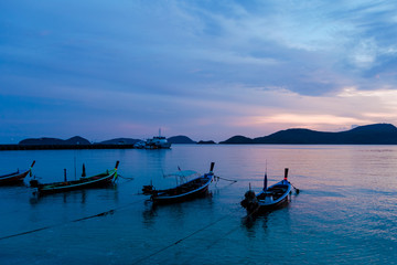 Fishing boats at sunset on Pan Wa
