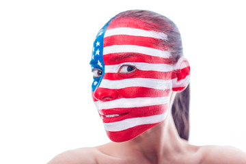 Portrait of a girl with a painted American flag, closeup