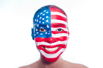 Portrait of a girl with a painted American flag, closeup
