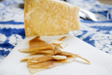 chunks and rind of parmigiano cheese