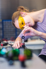 Female scientist carrying out research experiments 