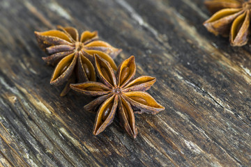 Closeup of star anise on wooden background