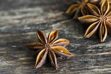 Closeup of star anise on wooden background