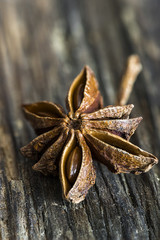 Closeup of star anise on wooden background