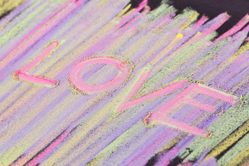 black light colored chalk graphic lines on blackboard. abstract background.