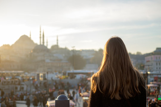  Young girl looks at traveling Mosque in Istanbul