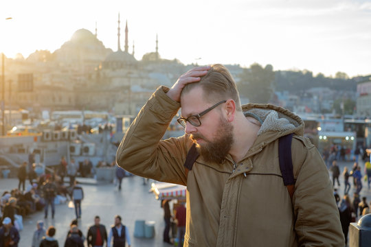 The young man looks at traveling Mosque in Istanbul