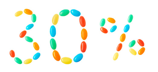 30% lettering made of multicolored candies isolated on white