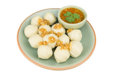 Dish of steamed fish ball and spicy dip  isolated on white backg