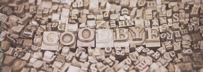 Close up of typeset letters with the word Goodbye