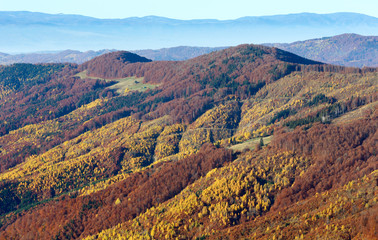 Naklejka premium Autumn colored mountain slopes.
