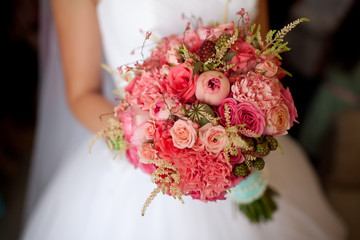 bride holding wedding bouquet