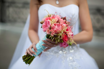 bride holding wedding bouquet