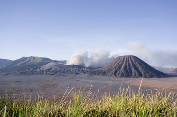 Fototapeta premium Eruption of mount Bromo in sunrise light in Bromo Tengger Semeru National Park, East Java, Indonesia
