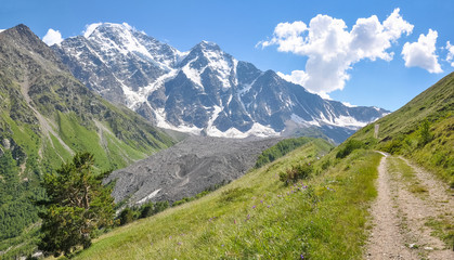 Mountain road and view of the Great Caucasus Range