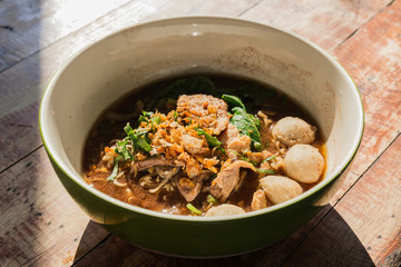 bowl of thai style beef noodle soup © sirayot111