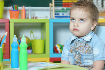 cute little boy drawing