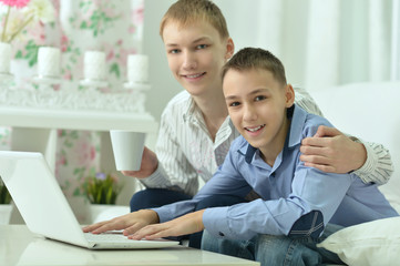 Young boys and  laptop computer