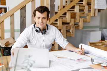 Young businessman in office