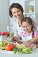 girl and mother prepare food