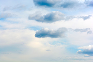 Fantastic soft white clouds against blue sky