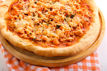 Salmon and herb pizza