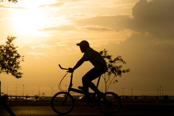 silhouette bike on sunset