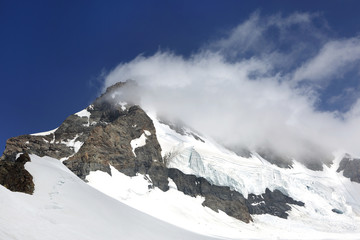 Fototapeta na wymiar Monch alps mountain in Jungfrau region of Switzerland
