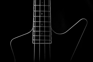 Obraz na płótnie Canvas Body of a classic black bass guitar