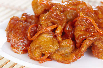 Chinese cuisine. Pork in batter and sweet and sour sauce
