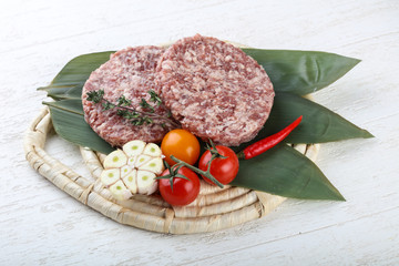 Raw burger cutlet