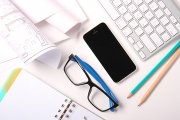 Office desk with supplies top view, Business desk with a keyboard, mouse and pen on white table