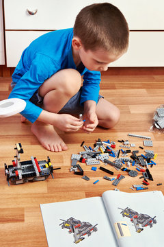 Little boy collects plastic children's designer