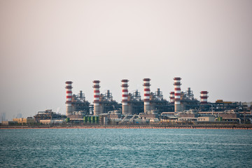 view of big oil refinery on a sky background