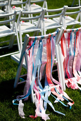 white chairs for a wedding ceremony 