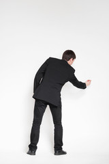 Successful and smart businessman writing imaginary text