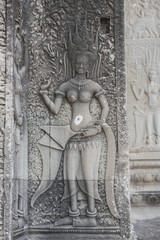 Fototapeta na wymiar Dancing womann or deity, Angkhor Wat, Cambodia