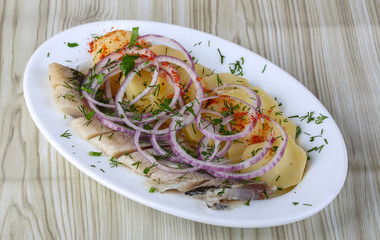 Herring with potato and onion
