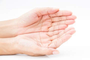 woman hands with open palms over white table