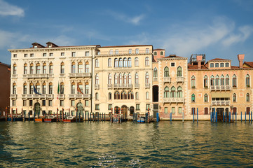 Fototapeta na wymiar Cityscape of the historical city against sunlight with blue sky, Venice
