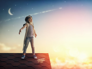 child playing with toy airplane