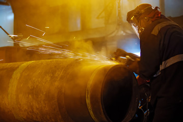 Sanding butt pipeline connection. Preparation of metal for welding. © eleonimages