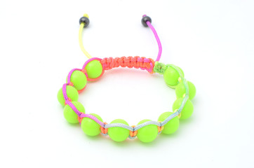 Bracelet with green beads isolated